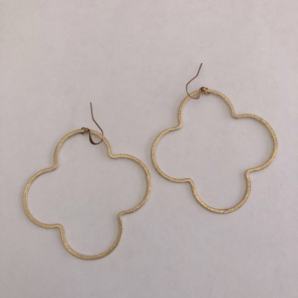 Gold toned quatrefoil pierced earrings